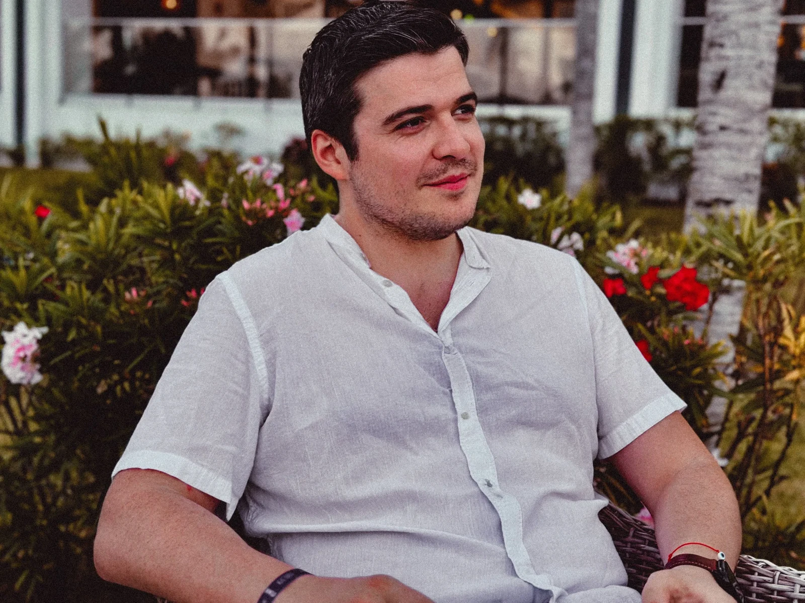 Tevis Shkodra sitting outdoors